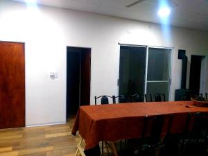 a conference room with a table and chairs in it at Las Calandrias in Villa Constitución +39 photos