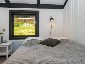 Postel nebo postele na pokoji v ubytování Holiday home Hejls LV