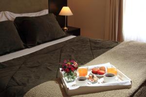 Katil atau katil-katil dalam bilik di De Los Arroyos Apart Hotel