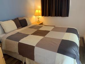 Letto o letti in una camera di Swiss Sunset Inn