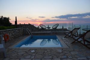 The sunrise or sunset as seen from A villát or nearby