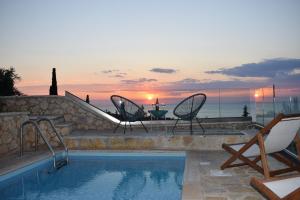 The swimming pool at or close to Villa Thetis with private pool where the sunsets fade away