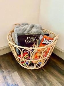 a basket filled with snacks on the floor at Luxury Apartment Close to Everything w Free Parking 5 in Houston