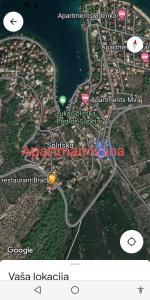 a map of a city with a yellow circle at Apartman Ivana in Splitska