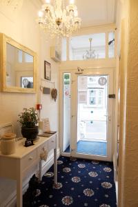 a hallway with a door leading into a room at Bella Vista Lodge in Blackpool