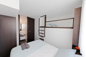 Poschodová posteľ alebo postele v izbe v ubytovaní Marina NS Guesthouse