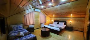 Lova arba lovos apgyvendinimo įstaigoje Qafqaz Mini Villa