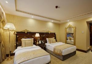 Postel nebo postele na pokoji v ubytování Ottoman's Life Hotel Deluxe