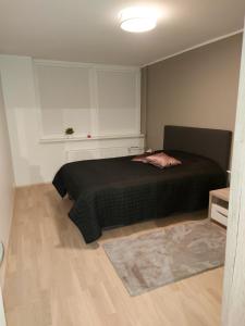 Postel nebo postele na pokoji v ubytování Vee 2 apartement