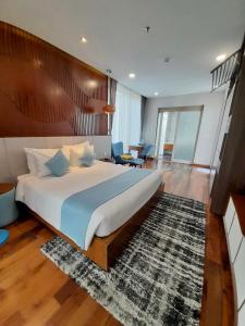 Postel nebo postele na pokoji v ubytování Okinawa Villas and Beach Club - Oceanami Resort