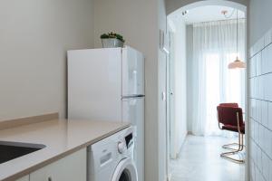 Kuchnia lub aneks kuchenny w obiekcie Guadalquivir Terrace Suite Apartments