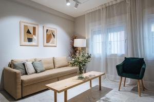 Część wypoczynkowa w obiekcie Guadalquivir Terrace Suite Apartments