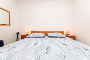 Łóżko lub łóżka w pokoju w obiekcie Apartment Josip Brusic