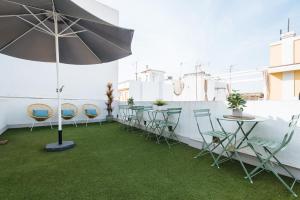 Zdjęcie z galerii obiektu Guadalquivir Terrace Suite Apartments w Sewilli