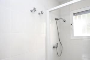 Kúpeľňa v ubytovaní AT005 Planta baja con piscina, airco, parking, playa a 600m