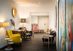 Posezení v ubytování Arthotel ANA Eden