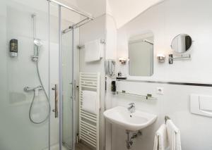 Koupelna v ubytování Arthotel ANA Eden