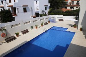 Bazén v ubytovaní AT025 Con piscina, airco, a 150m de la playa alebo v jeho blízkosti