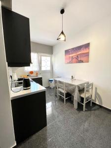 Kuchyň nebo kuchyňský kout v ubytování Atrium Apartment #1