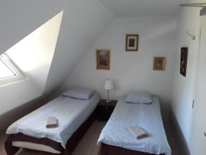 Postel nebo postele na pokoji v ubytování Luigeranna B&B