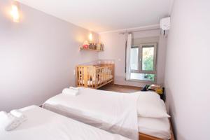 Postel nebo postele na pokoji v ubytování House Euphoria