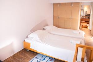 Postel nebo postele na pokoji v ubytování House Euphoria