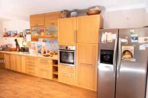 Kuchyň nebo kuchyňský kout v ubytování House Euphoria