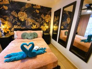 Кровать или кровати в номере El Encanto Condominiums