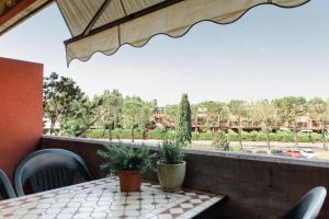 En balkon eller terrasse på Appartamento Afrodite