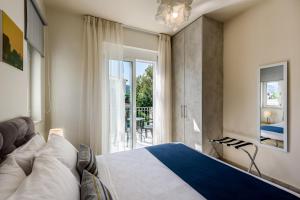 Postel nebo postele na pokoji v ubytování Azure Beach Villas