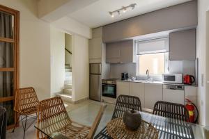 Kuchyň nebo kuchyňský kout v ubytování Azure Beach Villas