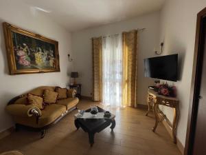 TV a/nebo společenská místnost v ubytování Casa vacanze Miceli