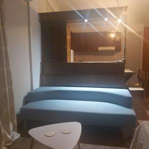 Postel nebo postele na pokoji v ubytování Rania city loft apartment