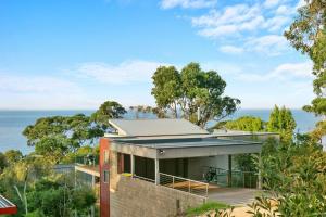 a house with a view of the ocean at Scelta in Lorne