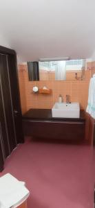 Vonios kambarys apgyvendinimo įstaigoje Appartamento mansardato iPatrizi