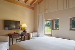 Llit o llits en una habitació de OAR Cottage