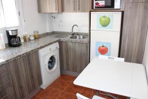 Kuchyň nebo kuchyňský kout v ubytování INCREIBLE APARTAMENTO CENTRO GRANADA ALHAMBRA