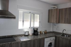 Kuchyň nebo kuchyňský kout v ubytování INCREIBLE APARTAMENTO CENTRO GRANADA ALHAMBRA