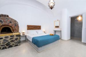 En eller flere senger på et rom på Anatoli Hotel & Spa