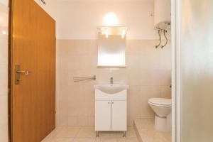 Kúpeľňa v ubytovaní Apartman Maura + 7 fotografií