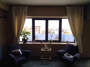 Posezení v ubytování Hotel Al Faro