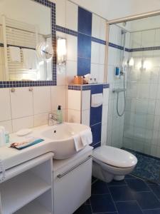 Koupelna v ubytování Hotel Garni Friesenhuus