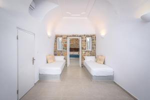 En eller flere senger på et rom på Anatoli Hotel & Spa