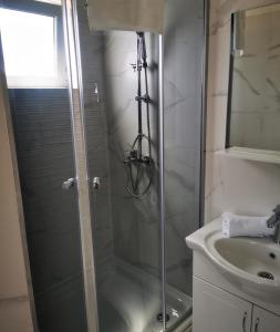 Koupelna v ubytování Apartmani "Ivan" + 30 fotografií