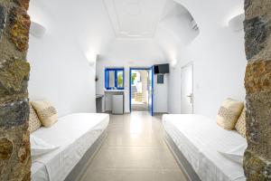 En eller flere senger på et rom på Anatoli Hotel & Spa