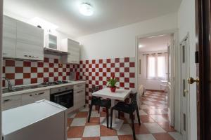 Kuchyňa alebo kuchynka v ubytovaní Pepigall Apartments