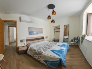 Posteľ alebo postele v izbe v ubytovaní Apartamentos Turísticos Hornillo AT-CC-00681