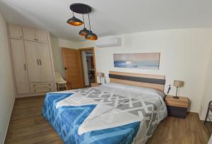 Posteľ alebo postele v izbe v ubytovaní Apartamentos Turísticos Hornillo AT-CC-00681