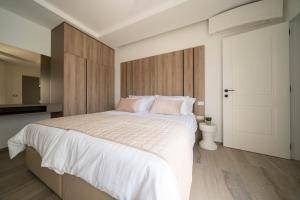 Łóżko lub łóżka w pokoju w obiekcie DʻArt Villa