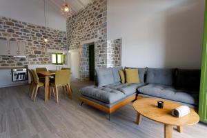 Kuchyň nebo kuchyňský kout v ubytování ARIS-APEA Villas
